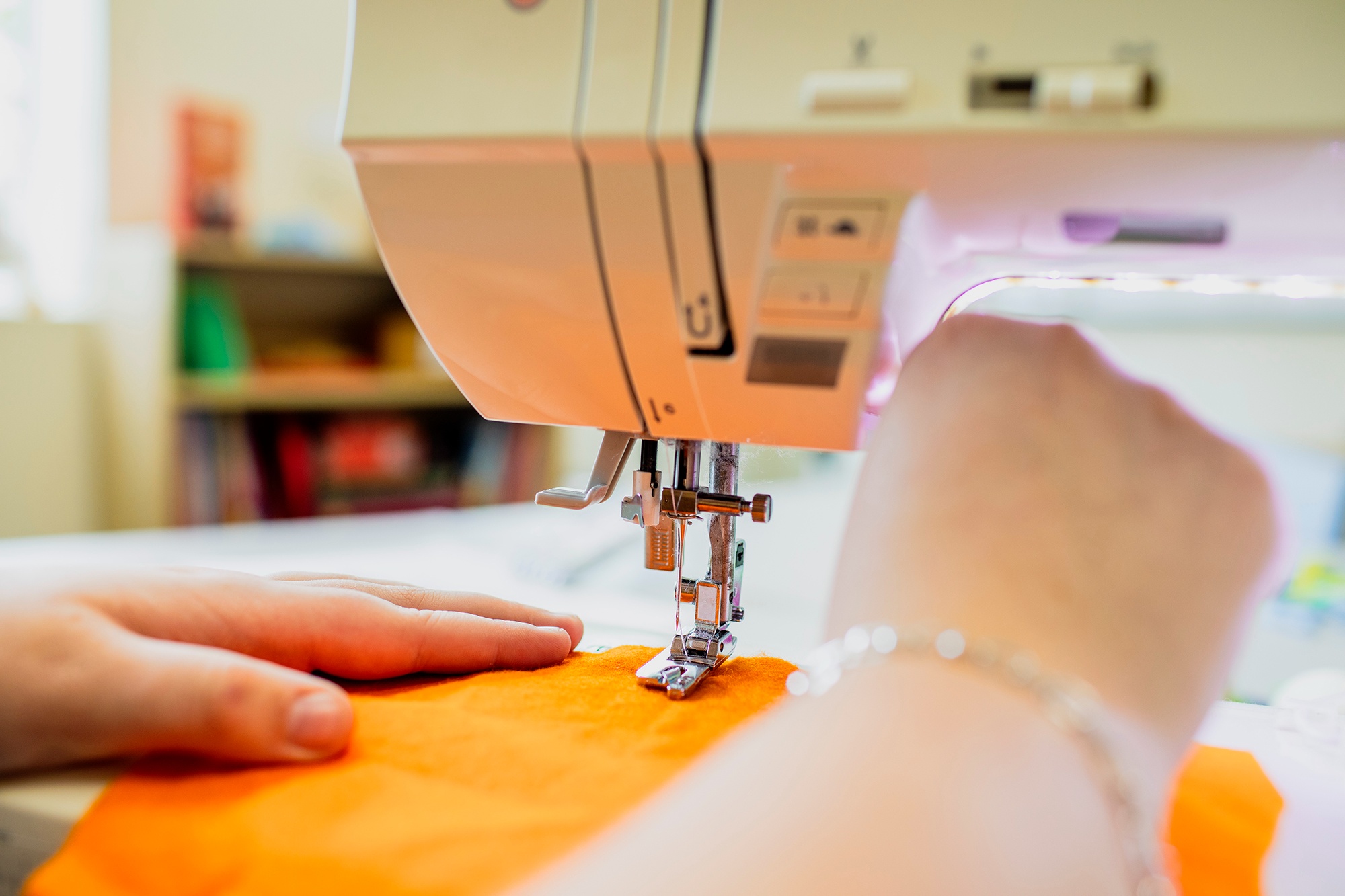 Image of student using a sewing machine